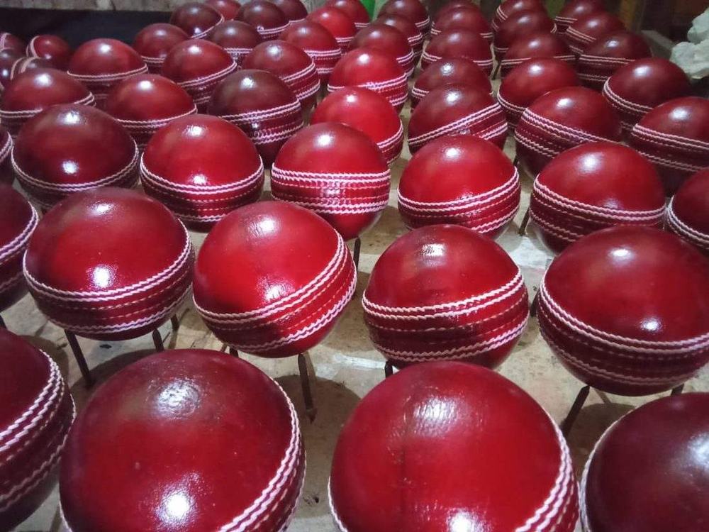 A full batch of finished red cricket balls
